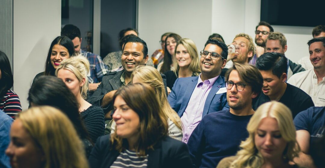 Group of professionals attending a workshop presentation