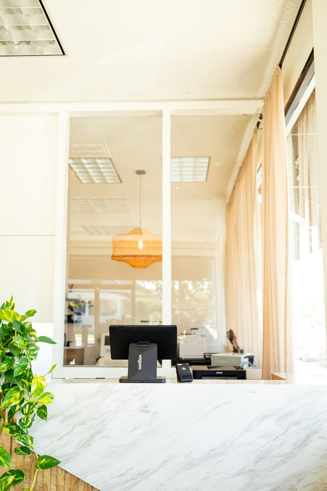 Bright reception desk area of a modern office